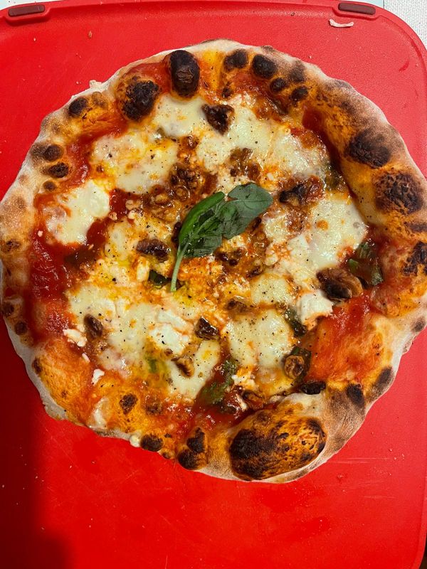 Making pizza with what you find in the kitchen (not your own).